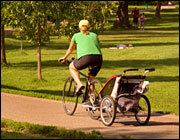 Biking with a kid trailer. Photo: iStockphoto