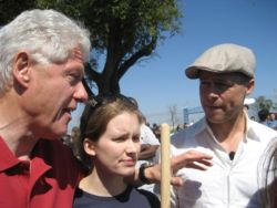 Bill Clinton and Brad Pitt with students at CGIU