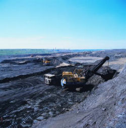 http://new-grist-develop.go-vip.net/wp-content/uploads/2009/02/oil_sands_open_pit_mining.thumbnail.jpg