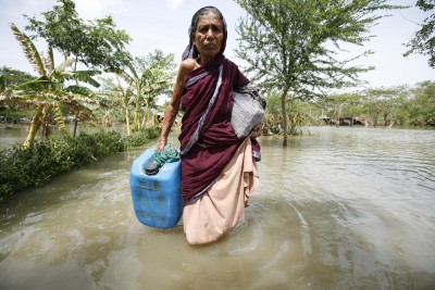 Woman in flooded area.