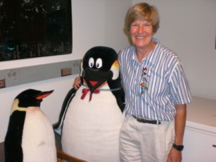 Dr. Boersma with stuffed animal penguins