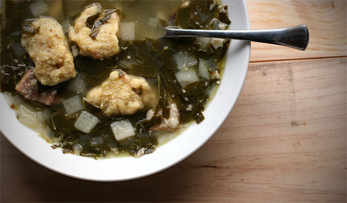 Collard greens, pork stock, and corn dumplings soak in the rich broth of history.