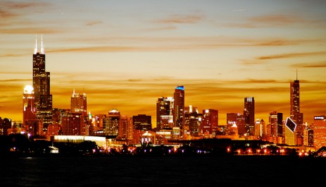 City skyline against orange sky