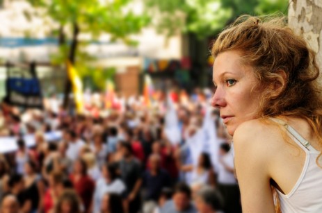 Woman watching protest