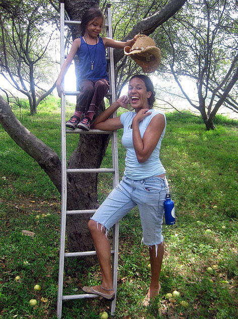 Natasha Bowens near a tree