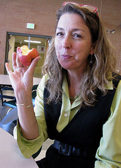 Woman eating apple