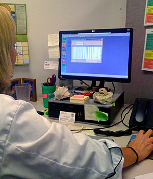 Woman looking at computer