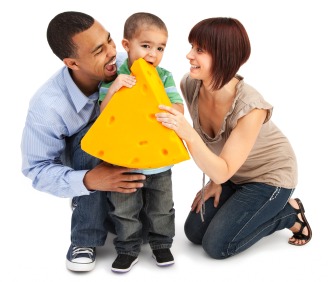 Parents and kid with cheese