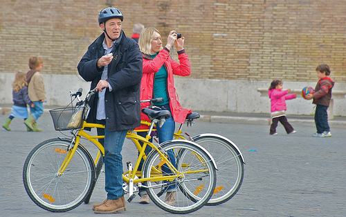 Couple on bikes.