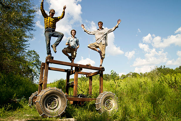 Open Source Ecology guys on a tractor