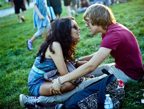 Couple sitting in the grass