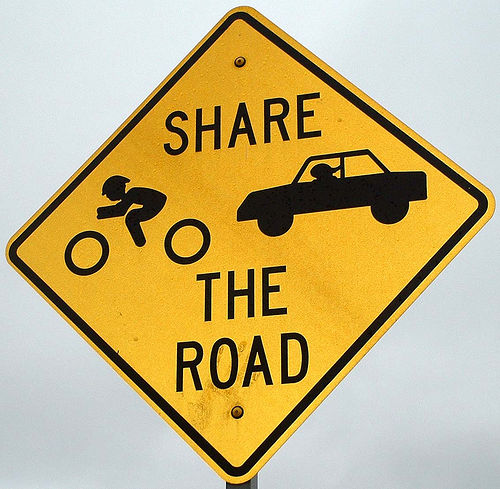 Share the road sign