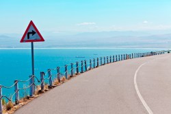 right-turn-road-sign-lake