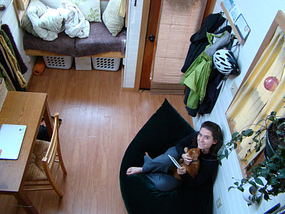 A view down from the sleeping loft into Lina’s main living space. 