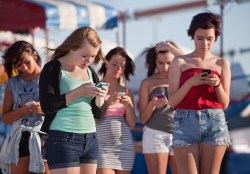 young women with smartphones