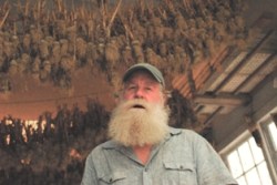 Scott Chaskey, Quail Hill's farmer-poet, surrounded here by 2012's garlic crop.