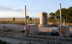 Tanks hold natural gas condensate and mark the spot of producing gas wells in the Pavillion field, in Fremont County, Wyo., in the heart of the Wind River Indian Reservation. The Environmental Protection Agency has found chemicals that are used in gas drilling in water wells near this site.