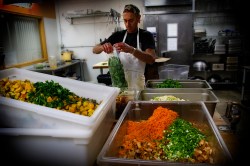 Making salads in the central kitchen.