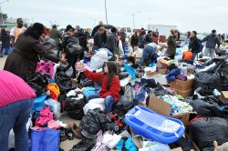 Victims of Hurricane Sandy receive aid in Queens. Expect more scenes like this in the future.