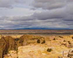 The uranium mine is proposed on terrain such as this, near Mt. Taylor, seen in the distance.