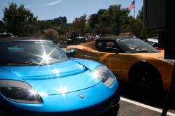 Tesla roadsters charging in the parking lot at the company's Silicon Valley headquarters.