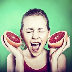 girl with grapefruit