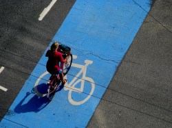 Many of Copenhagen's bike tracks are painted blue where they cross intersections, sending a clear message to drivers to stay out.