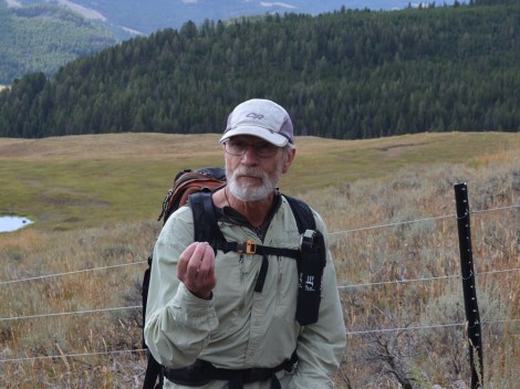 Jesse Logan hiking up Packsaddle Peak in search of whitebark pine.