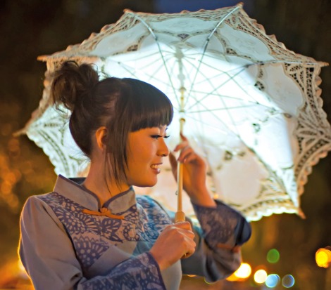 A woman sports vintage Chinese fashion in the Forbidden City