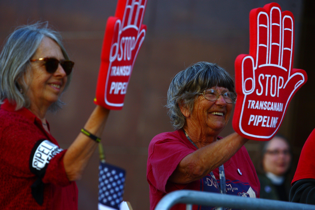 women protesting Keystone