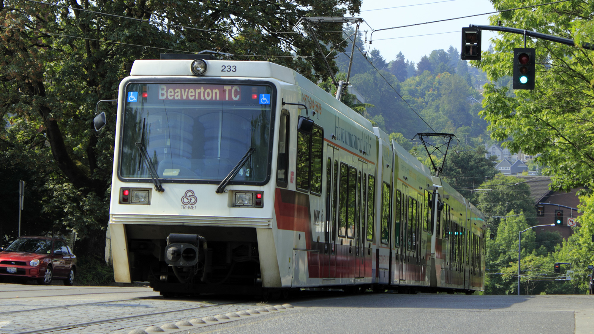 light rail on tree-lined Portland street