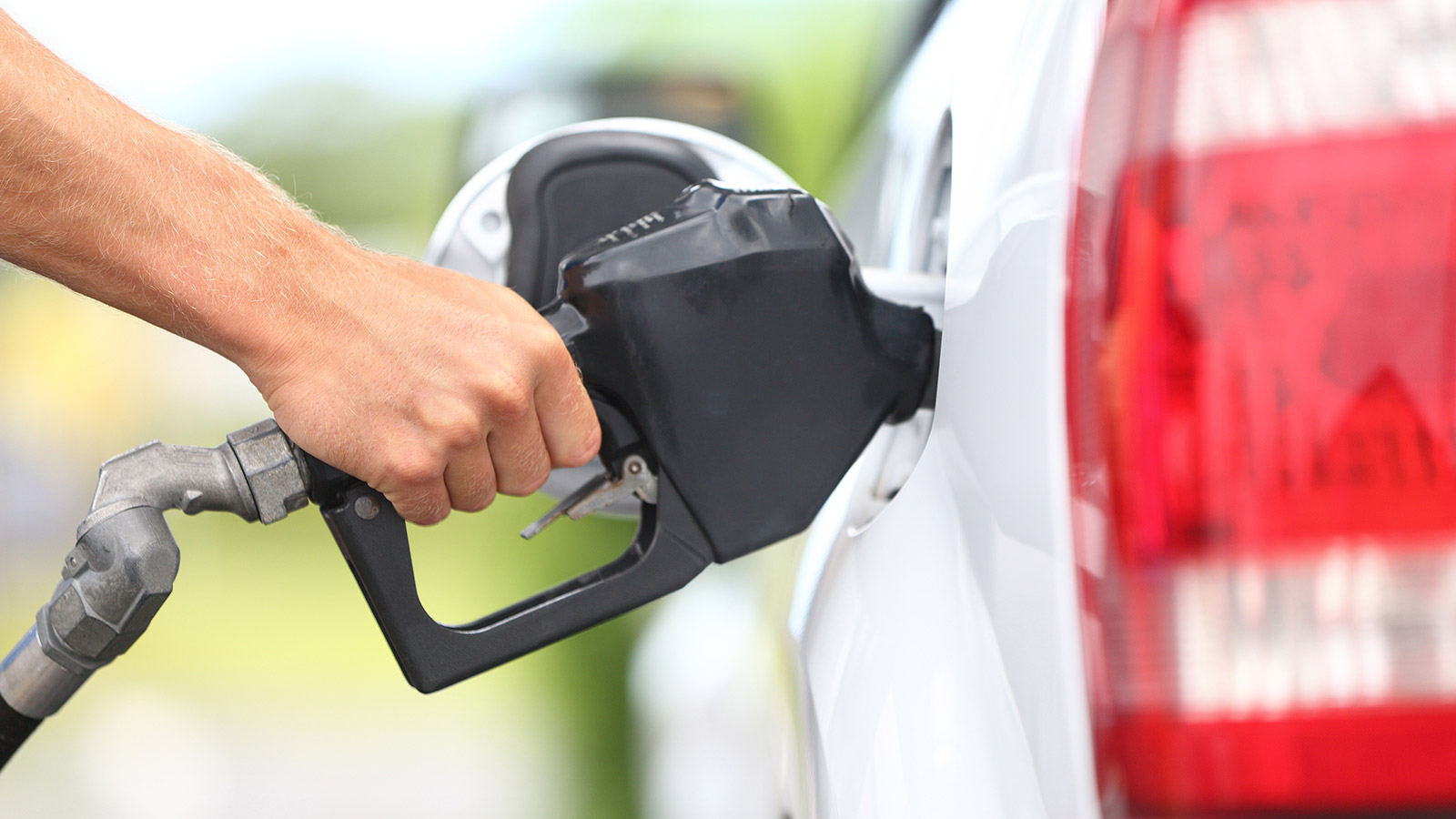 hand pumping gas