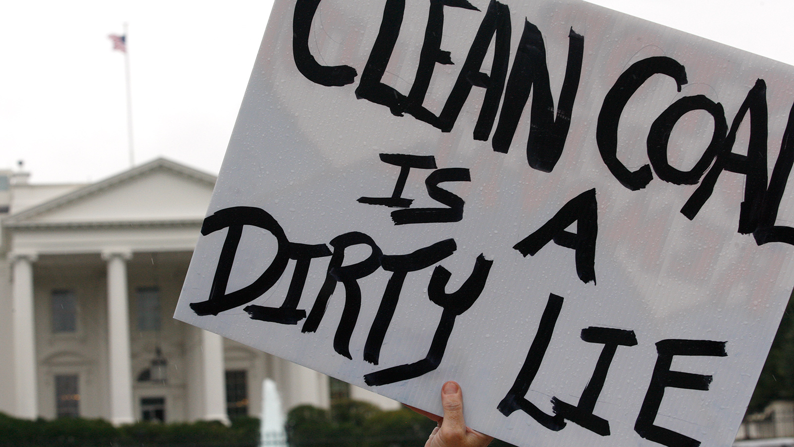 sign in front of White House: 