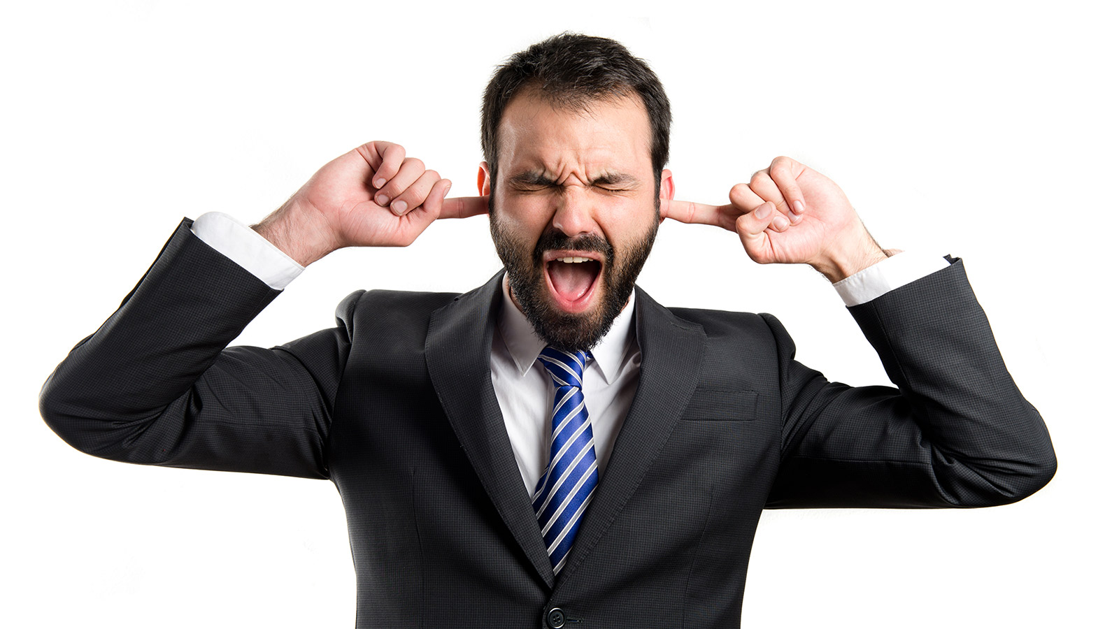 man with closed eyes and fingers in ears