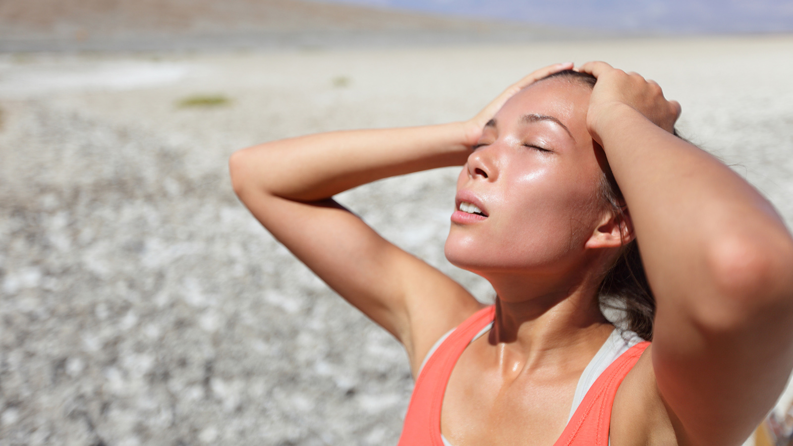 woman in desert, feeling the heat