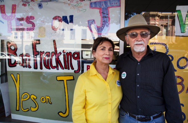 Margaret Morales Rebecchi stands with her husband Larry Rebecchi outside the Protect San Benito office in Hollister, Calif. 