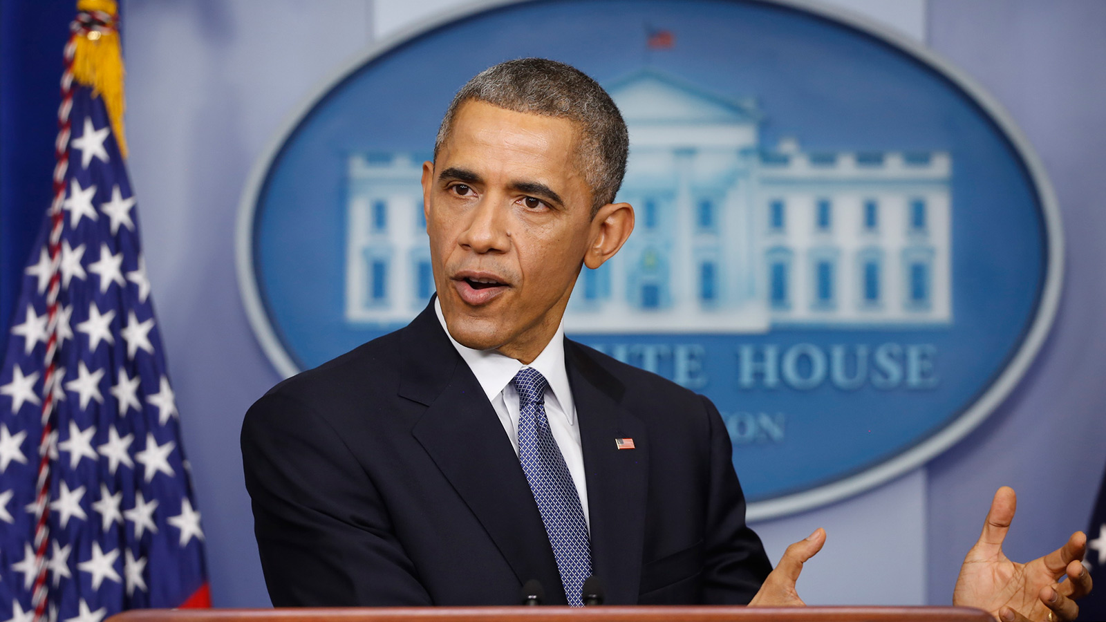 U.S. President Barack Obama answers a question about the administration's new policy on Cuba after his end of the year press conference in the briefing room of the White House in Washington, December 19, 2014.