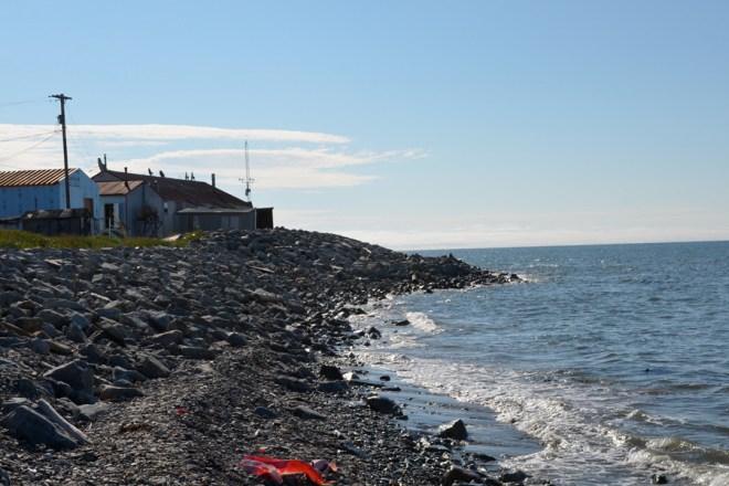 The residents of Shishmaref have moved houses away from the cliffs and constructed barriers, like this one, along the northern shore of the island to try to turn back the waves.