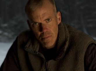 Bill McKibben, pondering how best to strangle your puppies.