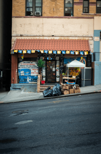 A photo of a bodega from Gail Victoria Braddock Quagliata's Tumblr, 40s and Flowers.