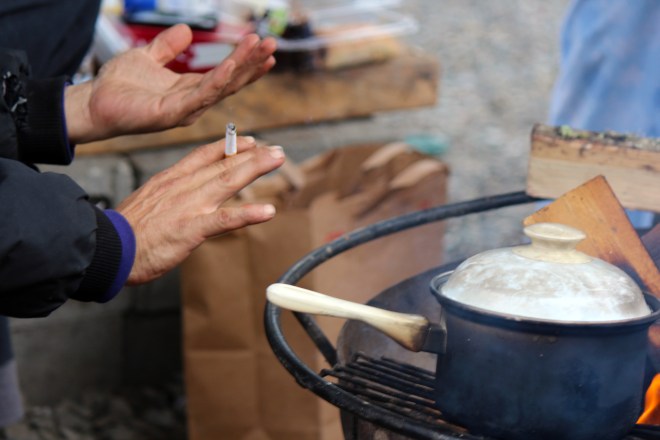 hands campfire