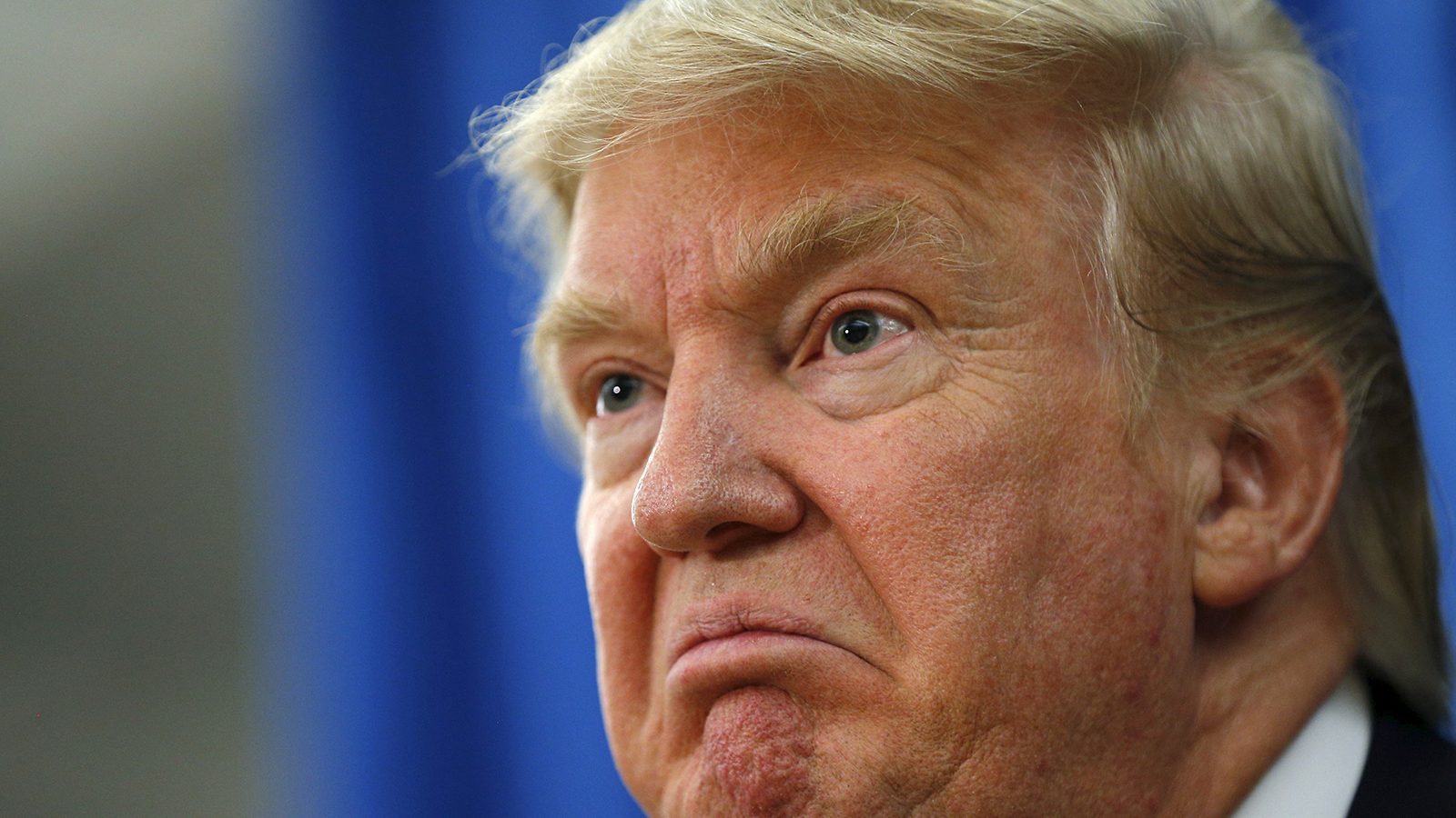 U.S. Republican presidential candidate Donald Trump answers a question at a news conference before a campaign rally in Hampton, New Hampshire August 14, 2015.