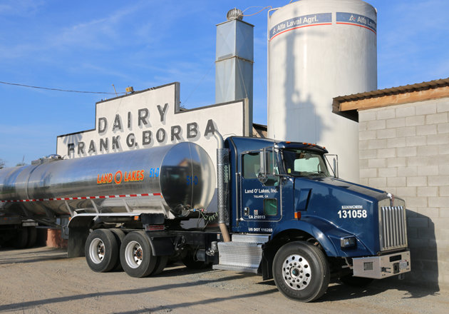 A Land O'Lakes truck fills up outside Eric Borba's dairy farm. 