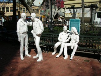 The Gay Liberation sculpture by George Segal in Christopher Park honoring the gay rights movement and commemorating the events at the Stonewall Inn opposite the park that gave rise to the movement.