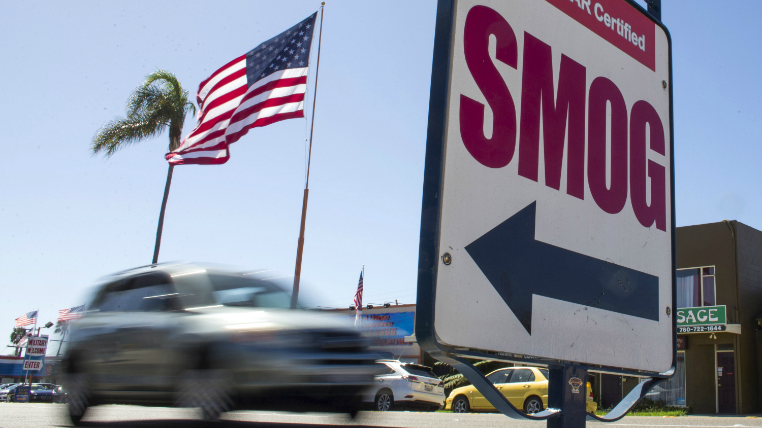 smog sign and flag