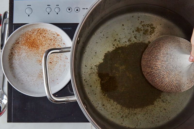 Step 3: Carefully lower your grain bag into the water to steep.