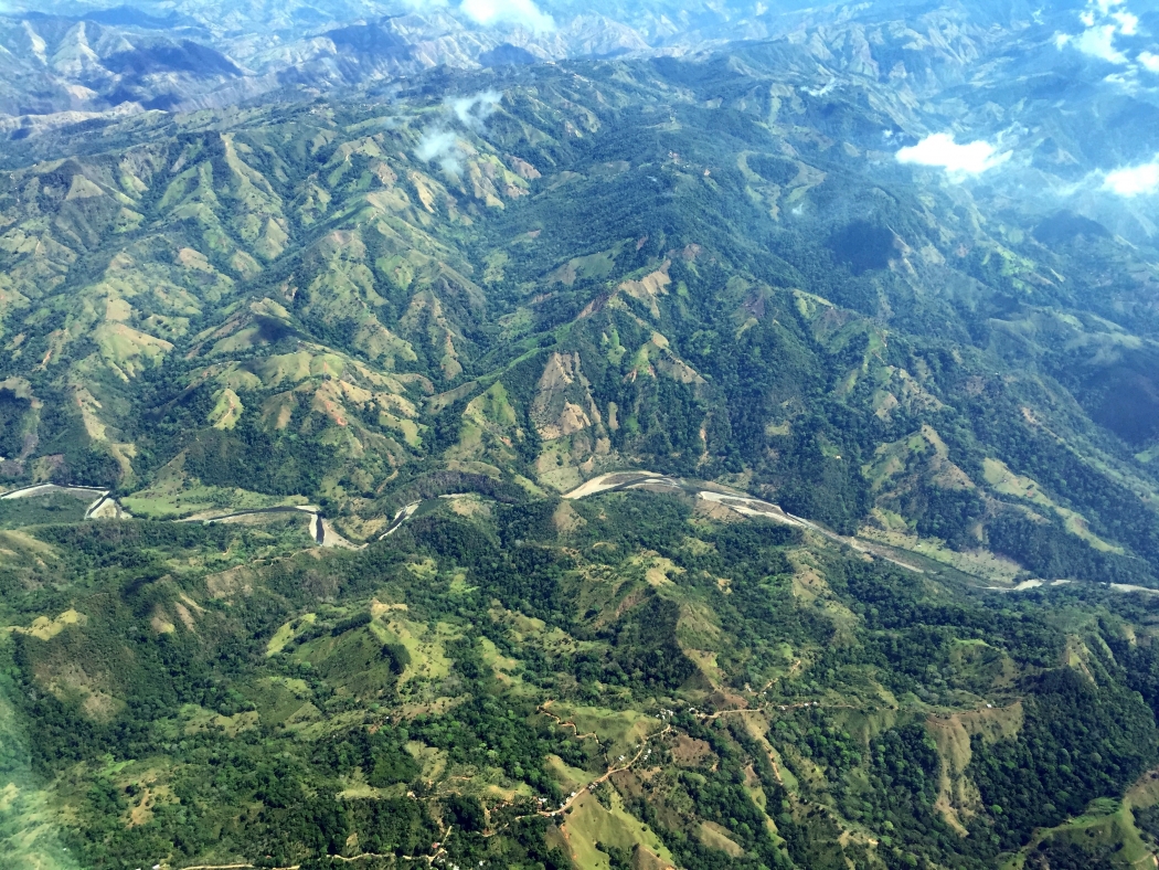 An aerial photograph of primary and secondary forest and agriculture fields on the Southern Pacific Coast of Costa Rica.