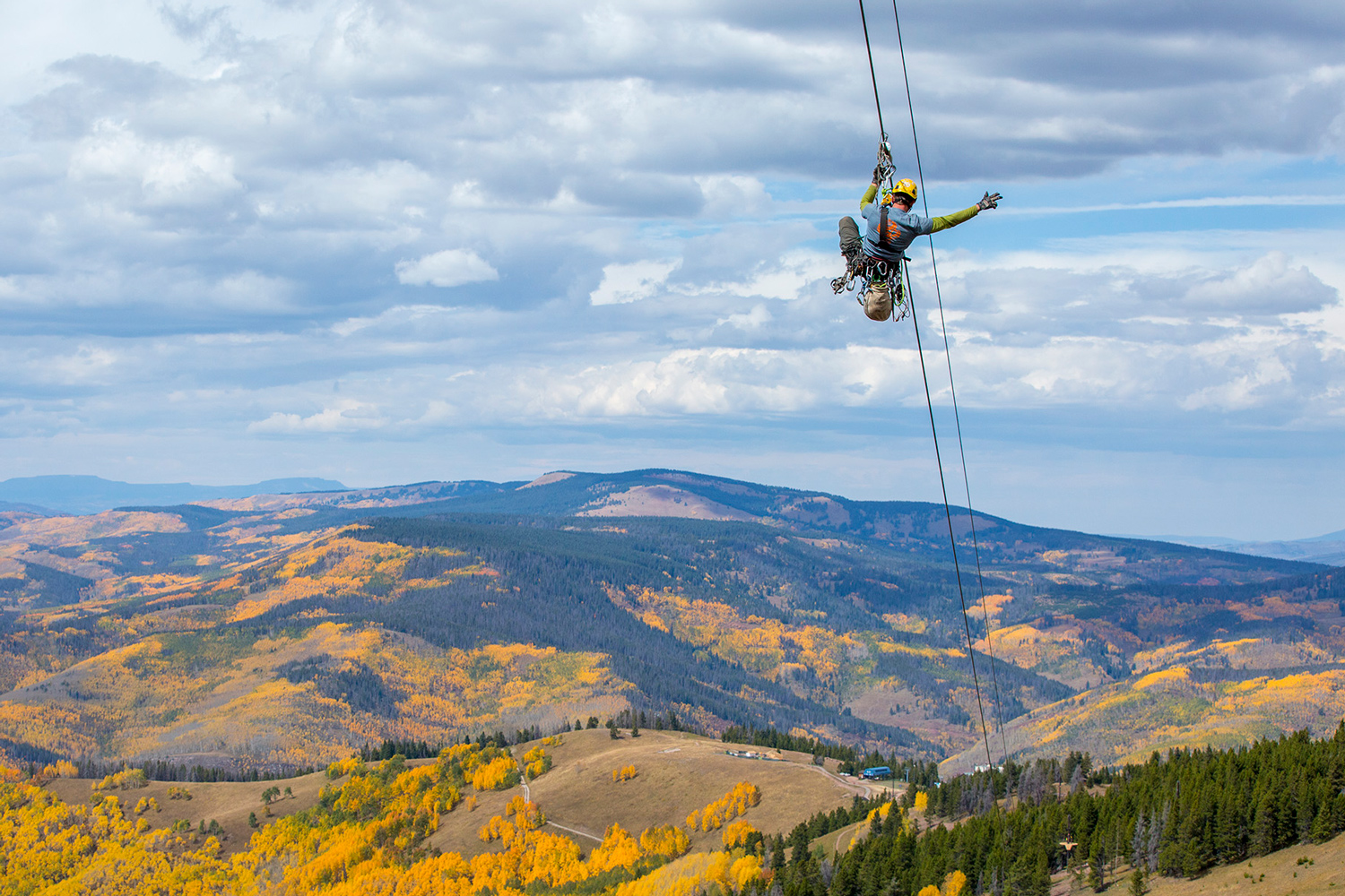 An employee tests the 1,200-foot-long zipline, which opened summer 2016 for Vail Resorts' summer activities.