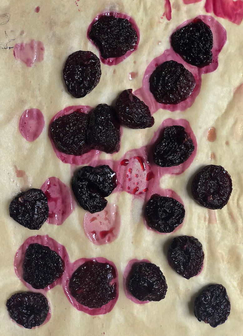 Cherry raisins on a baking sheet