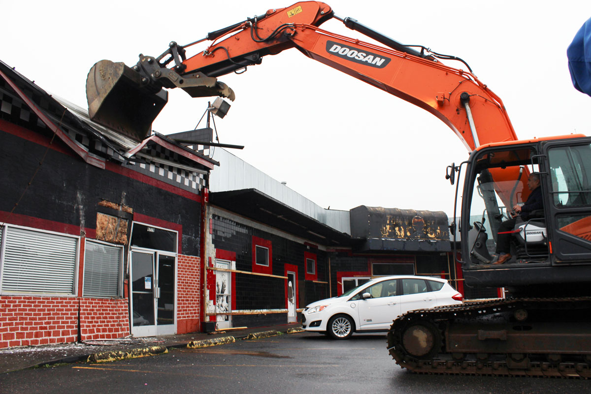 With a large crowd of community members as an audience, the Sugar Shack in Cully neighborhood is destroyed to make room for a new affordable housing development, Las Adelitas.